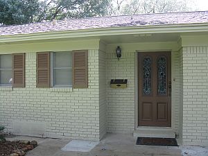 exterior painted brick, trim and shutters